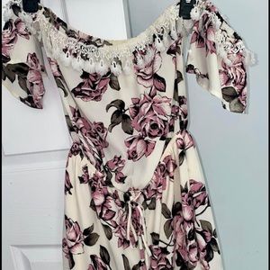 Purple floral romper - size small